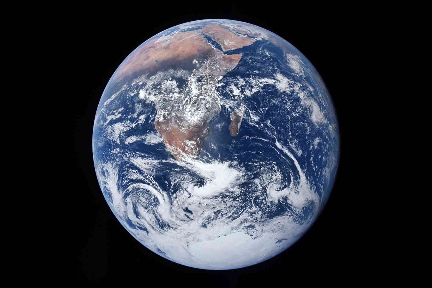 A fully illuminated Earth photographed from space by the crew of the Apollo 17 spacecraft on December 7, 1972