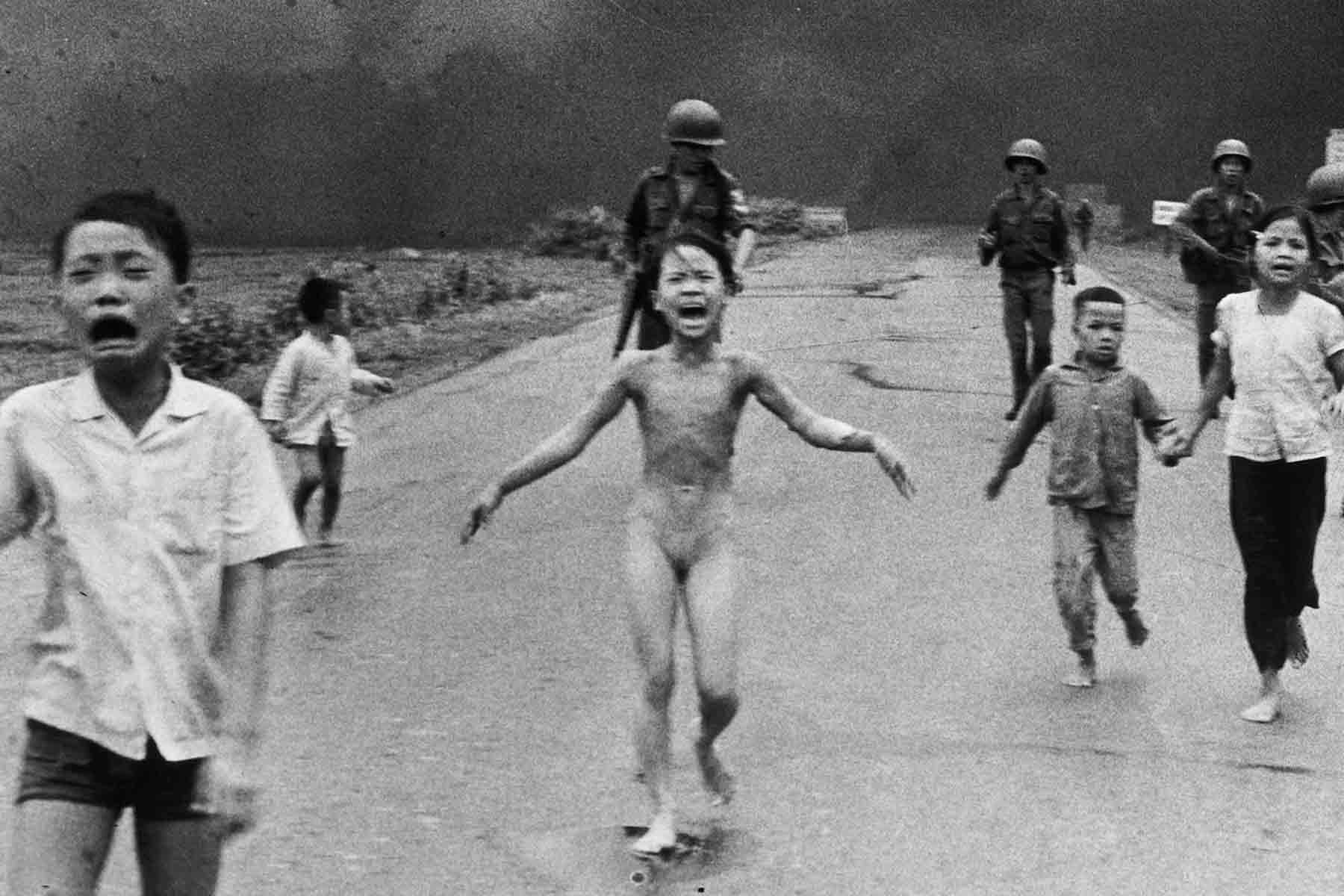 A young Phan Thi Kim Phuc running naked down a road near Trảng Bàng, Vietnam (1972)