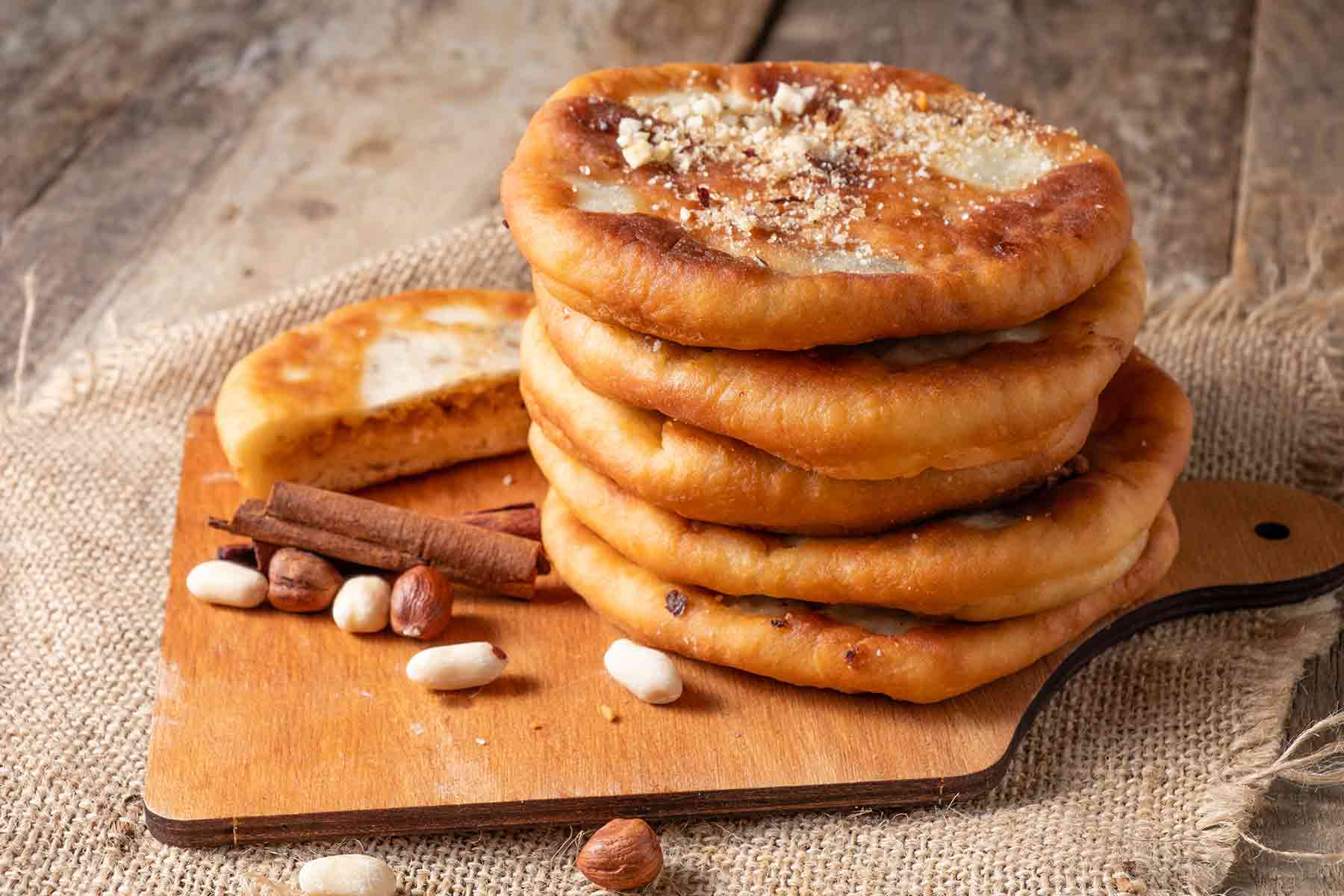 Sweet Korean hotteok made from fried dough filled with nuts and cinnamon