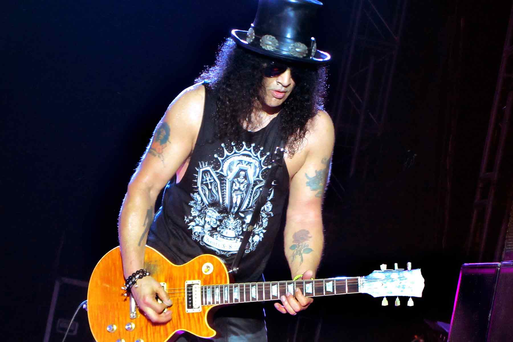 Slash performing in Venezuela in 2013 (Photo credit: Flickr/Edvill)
