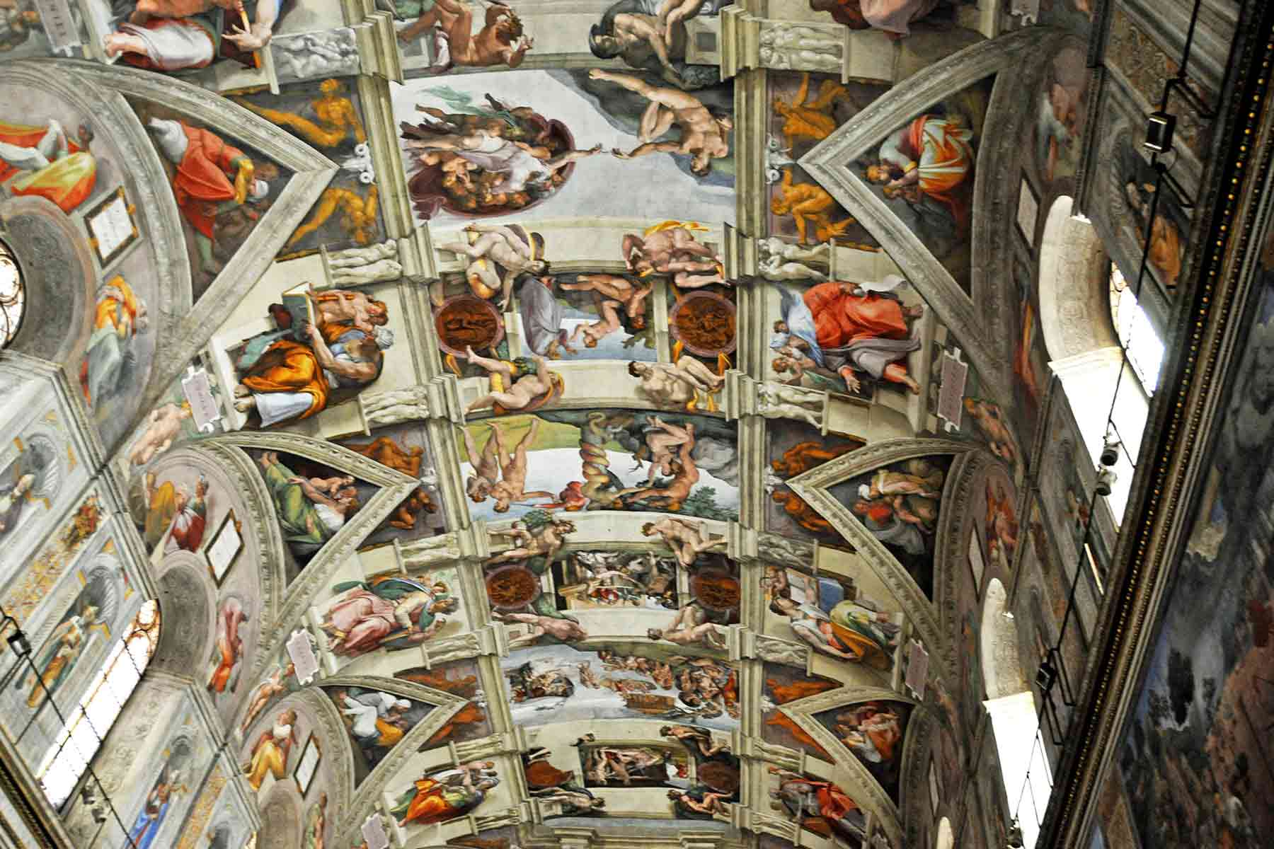 The famous ceiling paintings of Michelangelo inside the Sistine Chapel (Photo credit: Wikimedia Commons/Dennis G. Jarvis)